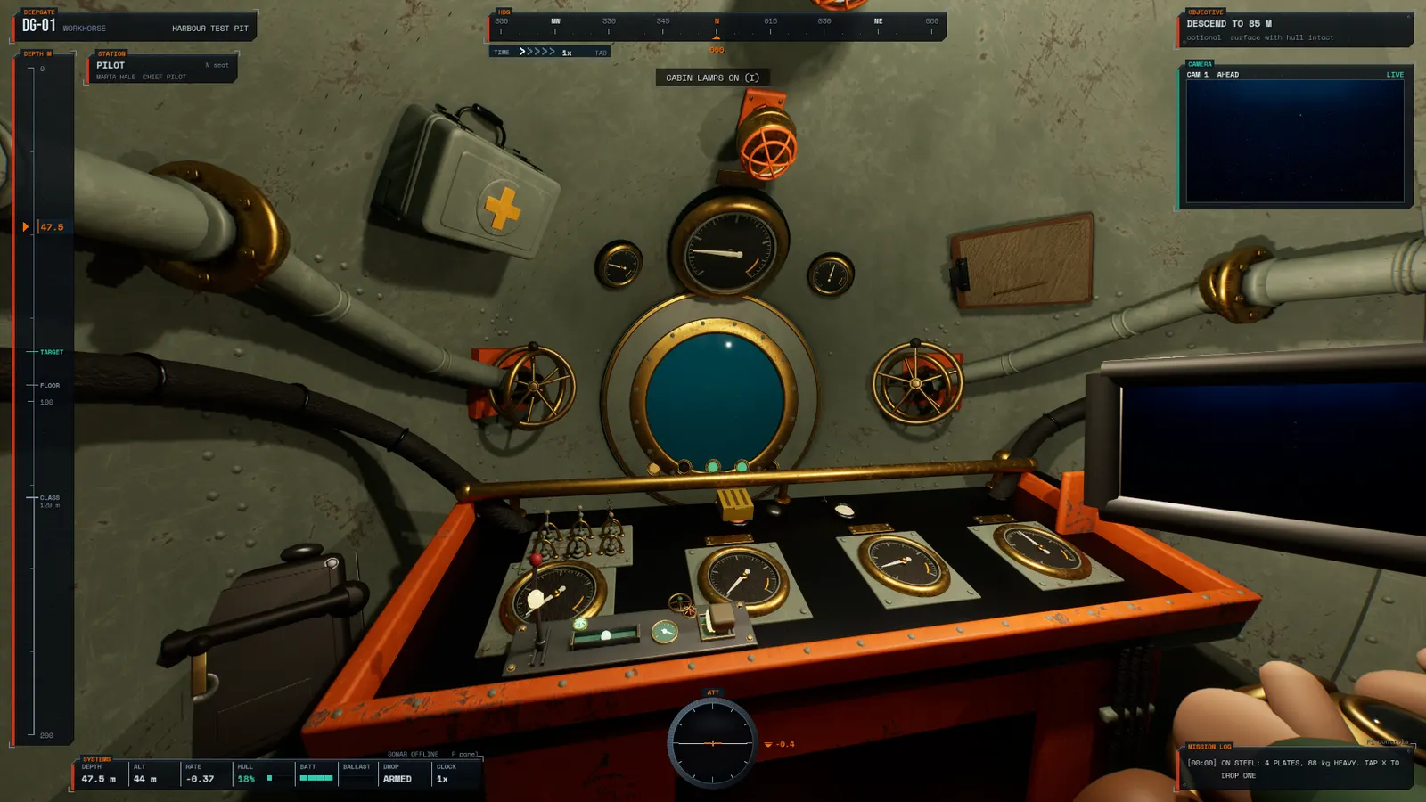 The cabin with a hull camera monitor lit beside the viewport